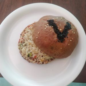 A burgizza a vegan burger pizza at Rare Earth Cafe & Organic Store in Mumbai