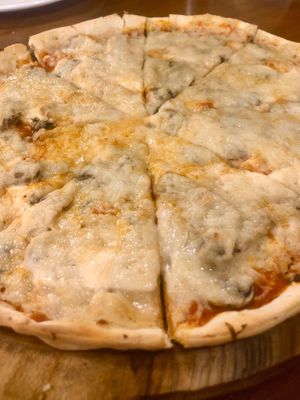 Fungi pizza with added smoked tofu - a taste sensation ! at Rare Earth Cafe & Organic Store in Mumbai