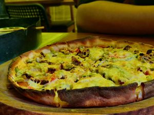 Pizza with mock meat at Rare Earth Cafe & Organic Store in Mumbai