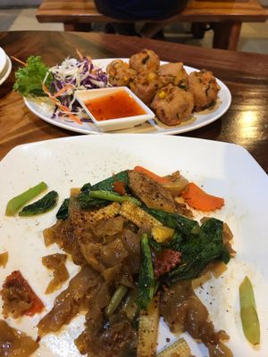 Fried balls and half eaten pad see ewe at Yo Vegan in Phuket