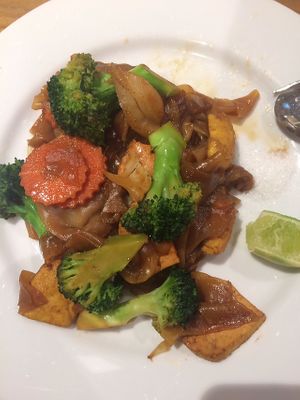 Veggie tofu stir-fry with wide flat rice noodles. 150THB. (Partially eaten like most of the pics I contribute!) at Yo Vegan in Phuket