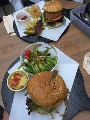 Portobello burger and quinoa lentil burger with sides at Real food - Far East Square in Central Singapore