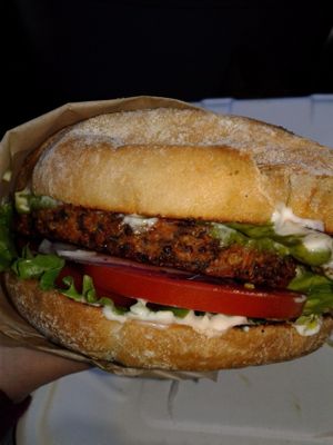 Vegan burger with avocado ginger sauce at Oasis Vegetarian Cafe in Riverside
