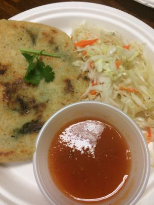Organic corn masa pupusa with spinach with Slaw and Hot Sauce at Oasis Vegetarian Cafe in Riverside