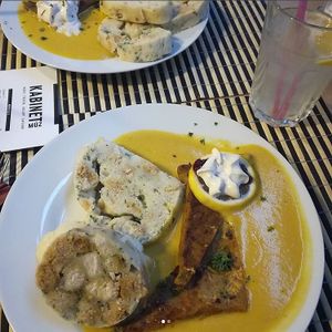 Grilled Seitan with cream sauce and amazing dumpling. The best dumplings we've ever eaten! at Die Küche in Brno