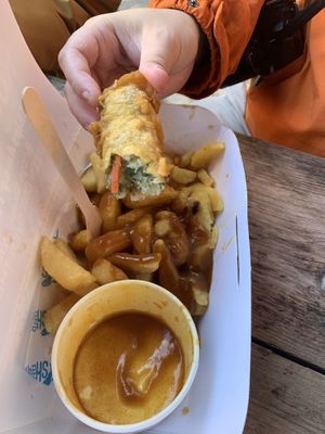Battered vegan sausage, chips and curry  at Robertson's Chips Away in Whitby