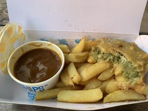 Pea bomb chips and curry sauce  at Robertson's Chips Away in Whitby