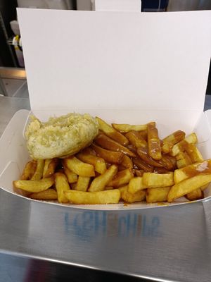 Pea fritters, chips and curry sauce at Robertson's Chips Away in Whitby