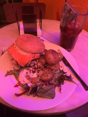 Red lighting because of closing time, but the food did look great on the plate   at Jonny Aldana in Barcelona