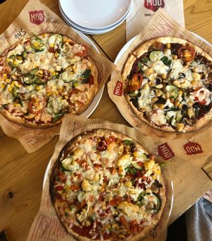 Self made pizzas with vegan cheese at Mod Pizza in London