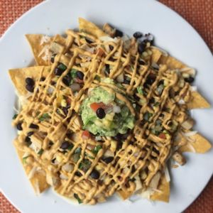 Vegan tortilla, queso, beyond meat chicken. beans, and gauc at Cafe Frida in New York City