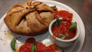 It is secret menu item!  Mi I deep dish with any pizza contents you want at Zen'za Pizzeria in London