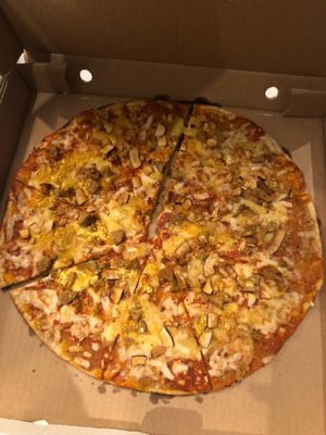 Vegan sausage and coconut bacon pizza at Zen'za Pizzeria in London