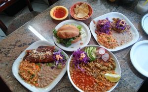 (Clockwise) Torta with cactus "meat," sopes (I don't remember if it was cauliflower or jackfruit), carne en jugo vegana, and mole burrito. at La Charrita in Santa Clarita