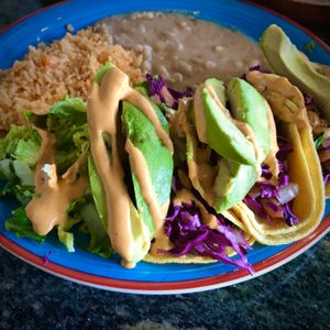 Jackfruit tacos w/ avocado, beans and rice. Delicious! at La Charrita in Santa Clarita