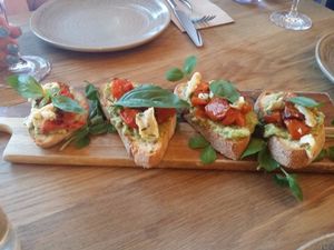Bruschetta with a herb cream cheese, roast pumpkin, kale - $16 at Assaggini in Mornington