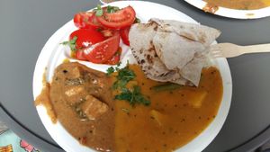 Dal, curry, chapati, rice, and "salad" at Hariprasad Samosa & Curry in Krakow