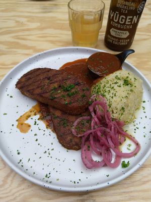 Homemade quinoa tempeh steak, gravy, mashed potatoes and pickled onions at Knol & Kool Bistro & Superet in Ghent