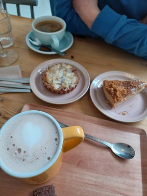 Frangipane cake and speculoostaart. Hot chocolate milk and coffee. at Knol & Kool Bistro & Superet in Ghent