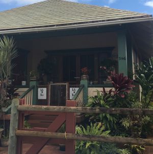 house in front of the cafe; walk alongside the right of the house. cafe is in the back. at The Greenery Cafe in Lihue