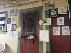 Cafe window. seating is covered and not covered.  at The Greenery Cafe in Lihue