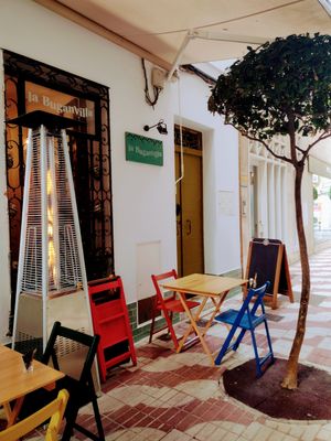 Cute outdoor seating at Taberna La Buganvilla in Algeciras