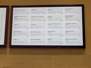 Menu board with many sorbet options at Pitango Gelato in Baltimore