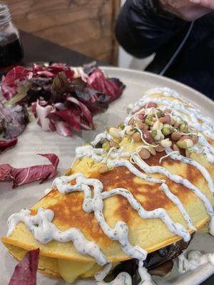 Amazing omelette filled with spinach and mushrooms with a dill dressing  at Retreat Kitchen in Richmond Upon Thames