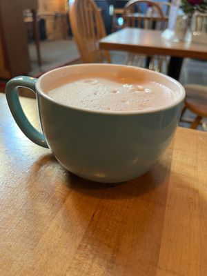 Chai latte with almond milk in ceramic mug at Rock Hill Bakehouse Cafe in Glens Falls