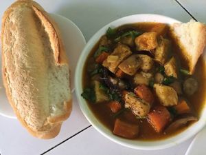 Cari + banh mi 15,000d at Moc Nhien in Hue