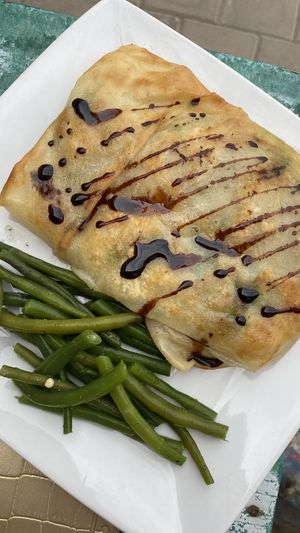 this was filled with spinach, potatoe and artichoke hearts, tasted amazing😄 at Le Corail at Latifa in Essaouira