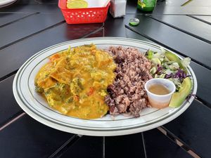 Curry tofu w rice and peas and salad. Vegan w/o any changes    at Sipho's Restaurant and Cafe in Chico