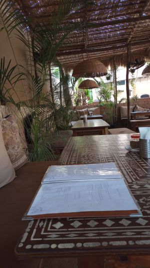 Rustic, earthy open- air restaurant  at Cafe La Boheme in Agonda