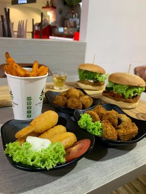 Banana Fritters $4.90, Mushroom Fritters $4.90, Sugarcane Drumsticks $5.90, Red Sweet Potato Fries $5.90 at NomVnom - Tai Seng in Central Singapore