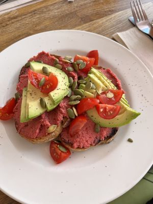 Avocado, hummus and tomatoes on toast   at Iydea in Brighton