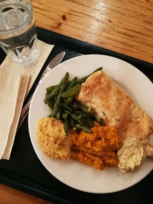 Sweet potato roti with carrot puree, Hummus and sugar snaps at Iydea in Brighton