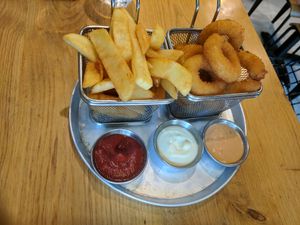 Fries and onion rings at Goodness in Tel Aviv