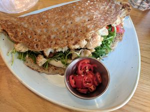 Buckwheat crepe, stuffed with cauliflower, tomato, and greens.  at Goodness in Tel Aviv