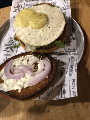 Hamburger with vegan sunny side up egg at Goodness in Tel Aviv