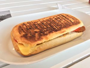 Panini with salami, cheese, tomato & jalapeños, £5.00. at Vegan HQ in West London