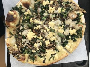 The white pie w/ mushrooms and sautéed kale added at Virtuous Pie in Portland