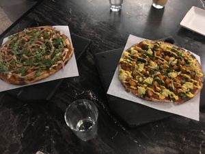 Two wonderful pizzas, including a curry pi! at Virtuous Pie in Portland