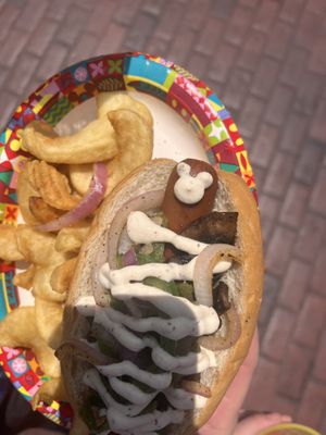 Mickey head they put on the dog with the mustard vegan cream sauce   at Disneyland - Award Weiners in Anaheim