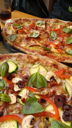 V1 and V3 off the menu, with fritz-kola in the background. at Organic Pizza in Salzburg