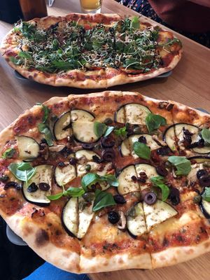 Vegan special pizza and vegan pizza #2 at Organic Pizza in Salzburg