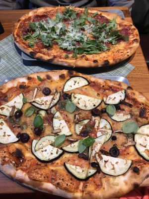 Amazing vegan pizza with vegan cheese and eggplant. Delicious crispy thin, wood-fired crust! at Organic Pizza in Salzburg