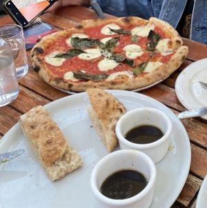 pizza and bread  at Donna Jean in San Diego