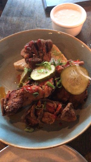 Hot mushrooms! Great spice! Delish pickles! Also got a the truffle cream sauce on the side    at Donna Jean in San Diego