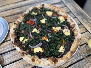 Widow Pizza. Best pizza on the planet! Add the garlic butter crust dip.  at Donna Jean in San Diego