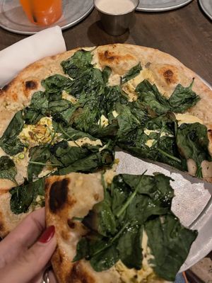 Pizza with “ricotta”, pistachio, spinachh  at Donna Jean in San Diego